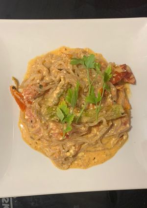 Foto principal de Pasta con feta, tomates cherry y espárragos verdes al horno