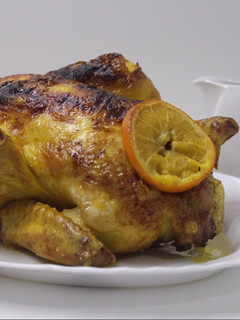 Una foto de Pollo al coñac y naranja
