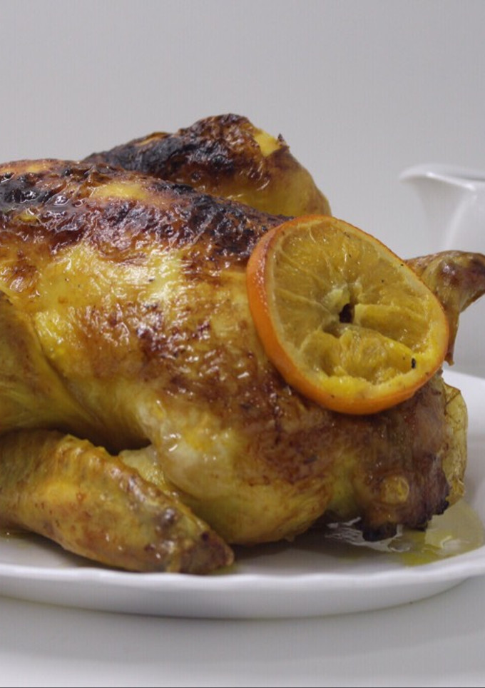 Una foto de Pollo al coñac y naranja