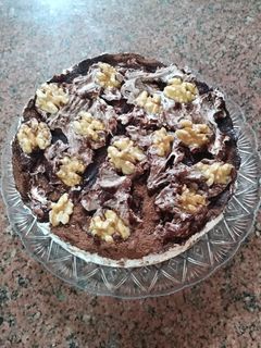 صورة لوصفة تورتة البسكوت ب نسكافيه وعين الجمل (الجوز)