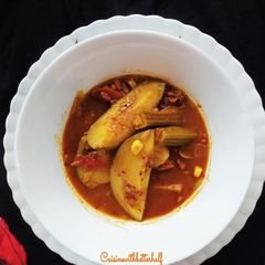 A picture of Tangy Mango Drumstick curry.