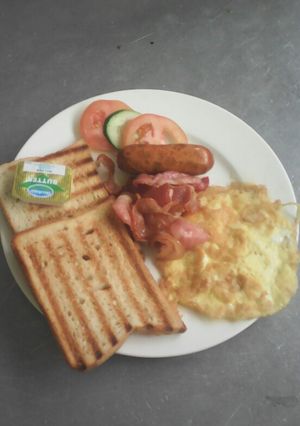 A picture of B. E. S. T (bacon,egg fried,sausage,toast bread).