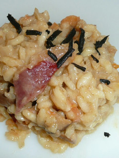 Una foto de Risotto de trufa negra y boletus edulis