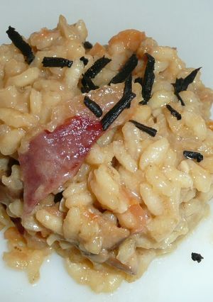 Una foto de Risotto de trufa negra y boletus edulis