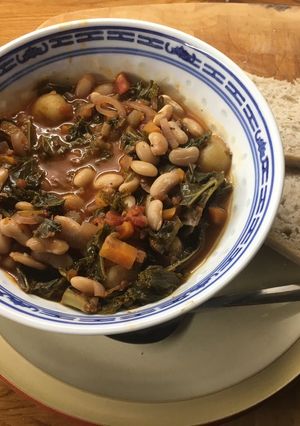 A picture of Italian Tomato Stew with Kale and Cannelini beans.