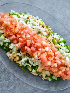 Una foto de Ensalada de alubias blancas