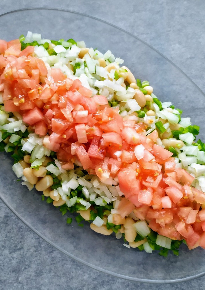 Una foto de Ensalada de alubias blancas