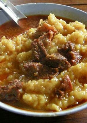 A picture of Rice and stewed Beef.