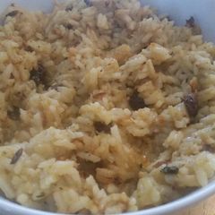 A picture of Roasted Acorn Squash & Raisin Rice.