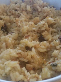 A picture of Roasted Acorn Squash & Raisin Rice.