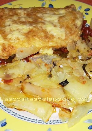 Foto principal de Bacalao al horno sobre cama de pimientos del piquillo y patata panadera