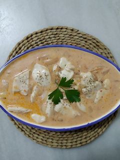 Una foto de Pollo con leche de coco