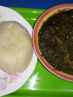 A picture of Afang soup with fufu.