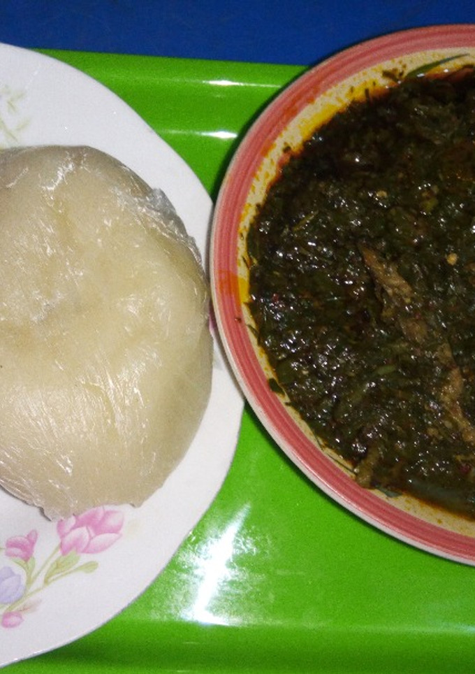 A picture of Afang soup with fufu.