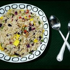 A picture of Quick Chicken Fried Rice🍚🥢💜💛💚.