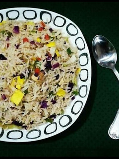 A picture of Quick Chicken Fried Rice🍚🥢💜💛💚.