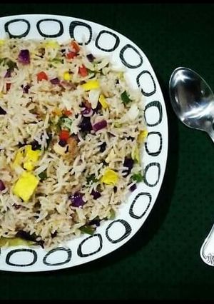A picture of Quick Chicken Fried Rice🍚🥢💜💛💚.