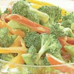 A picture of Brocolli and bell pepper salad.