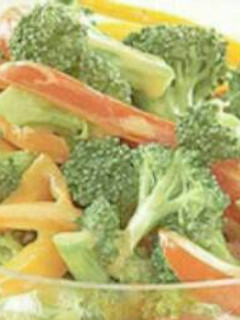 A picture of Brocolli and bell pepper salad.
