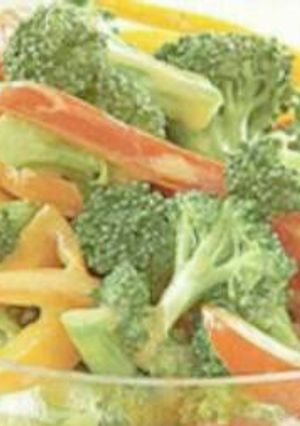 A picture of Brocolli and bell pepper salad.