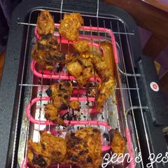 A picture of Electric Griller Chicken.