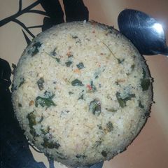 A picture of Dambun shinkafa with zogale and groundnuts.