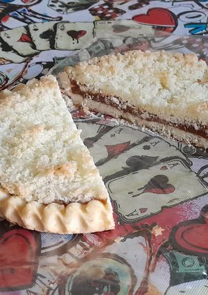 Una foto de Tarta de coco con dulce de leche 🤤