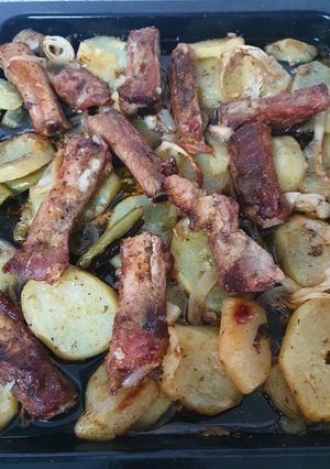 Foto principal de Costillas de cerdo con patatas al horno