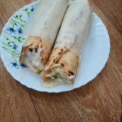 A picture of Veg shawarma famous in middle east country.