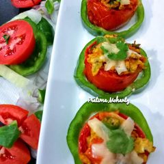 A picture of Grilled Tomato with Egg Cheese Bhurji.