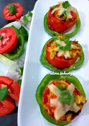 A picture of Grilled Tomato with Egg Cheese Bhurji.