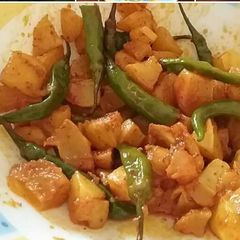 Kachcha aam and green chilli instant achar A picture of Kachcha aam and green chilli instant achar.