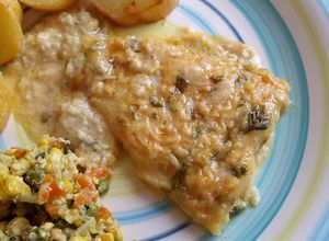 Una foto de Filetes de panga al horno en salsa de queso y crema