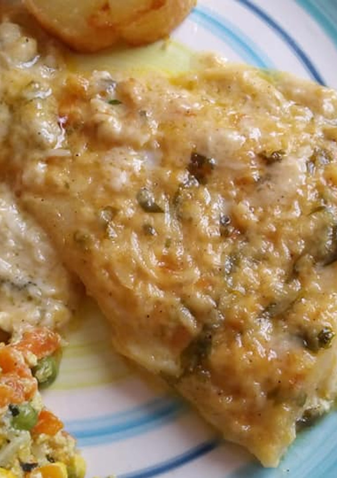 Una foto de Filetes de panga al horno en salsa de queso y crema