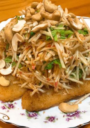 A picture of Apple Salad with fish.