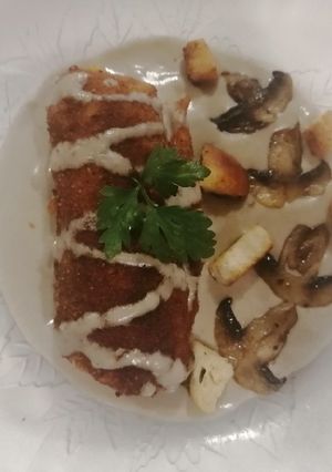 Una foto de Pechugas rellenas con crema de champiñones a base de bechamel