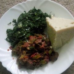 A picture of Ugali spinach and liver.