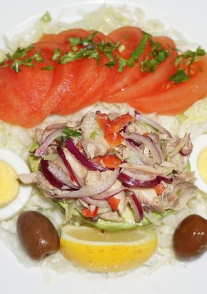 A picture of Avocado Stuffed with Mackerel Salad.