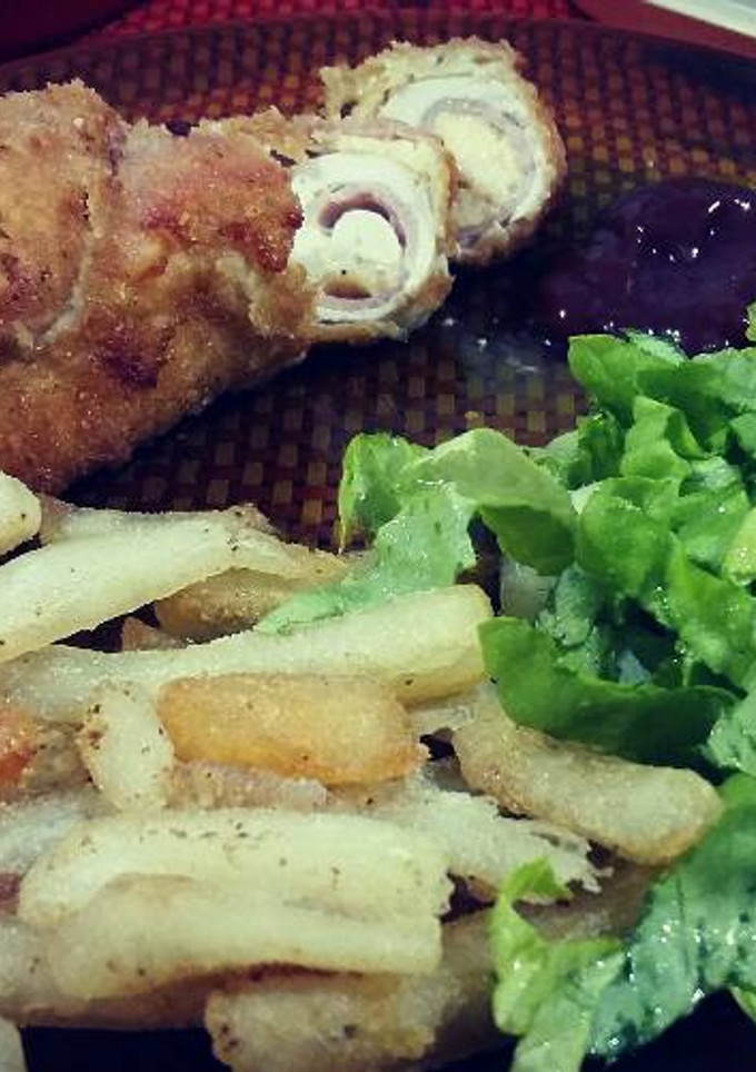 Una foto de Rollitos de pollo con jamón y queso
