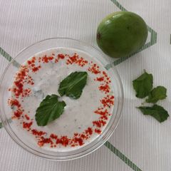 A picture of Raw mango & grapes raita.