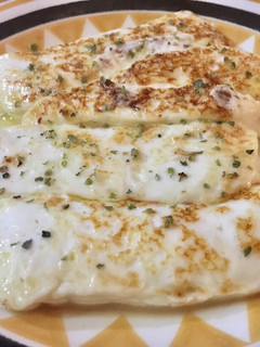 Una foto de Queso fresco a la plancha con orégano