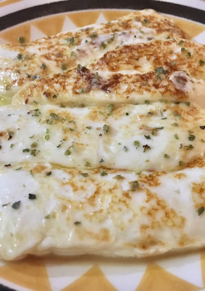 Una foto de Queso fresco a la plancha con orégano