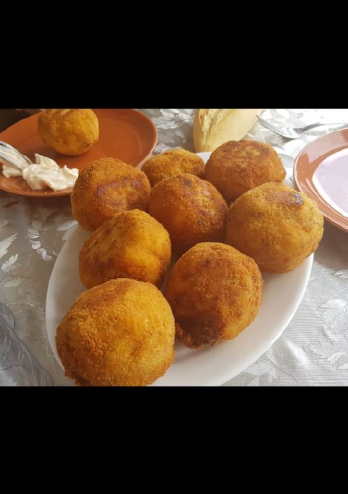 Una foto de Bomba de patatas con jamón y queso