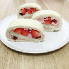 A picture of Strawberry mousse white roll cake.