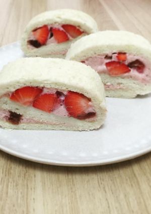 A picture of Strawberry mousse white roll cake.