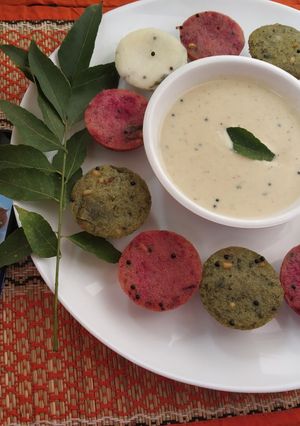 A picture of Multi coloured idli.