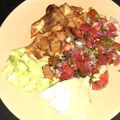Fried pork/ugali/kachumbari/avocado A picture of Fried pork/ugali/kachumbari/avocado.