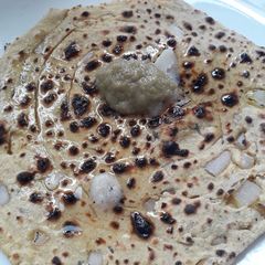 A picture of Tandoori missi roti on tawa.