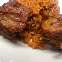 A picture of Jollof rice and turkey.