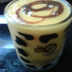 A picture of Mango -curd smoothie.